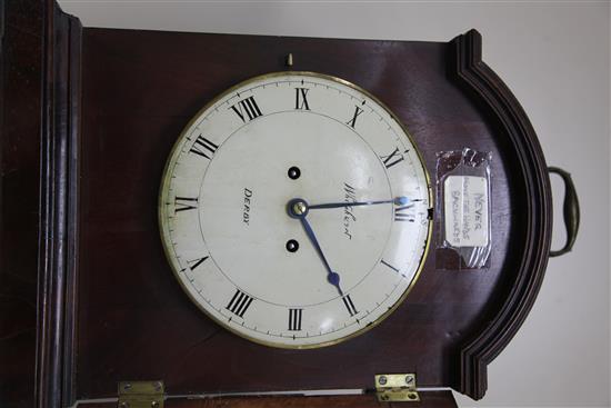 An early 19th century single pad top mahogany table clock, height 19in.